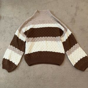 Brown, cream and white sweater